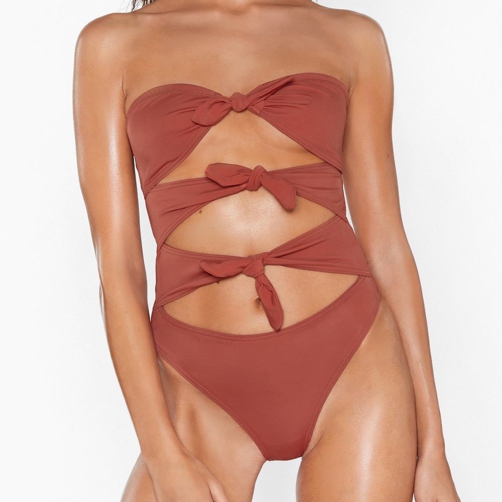 Strapless front tie cut out one piece size 4